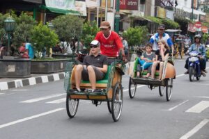 Becak with foreign passengers