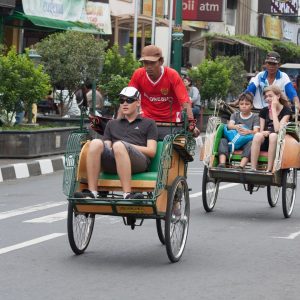 Becak with foreign passengers